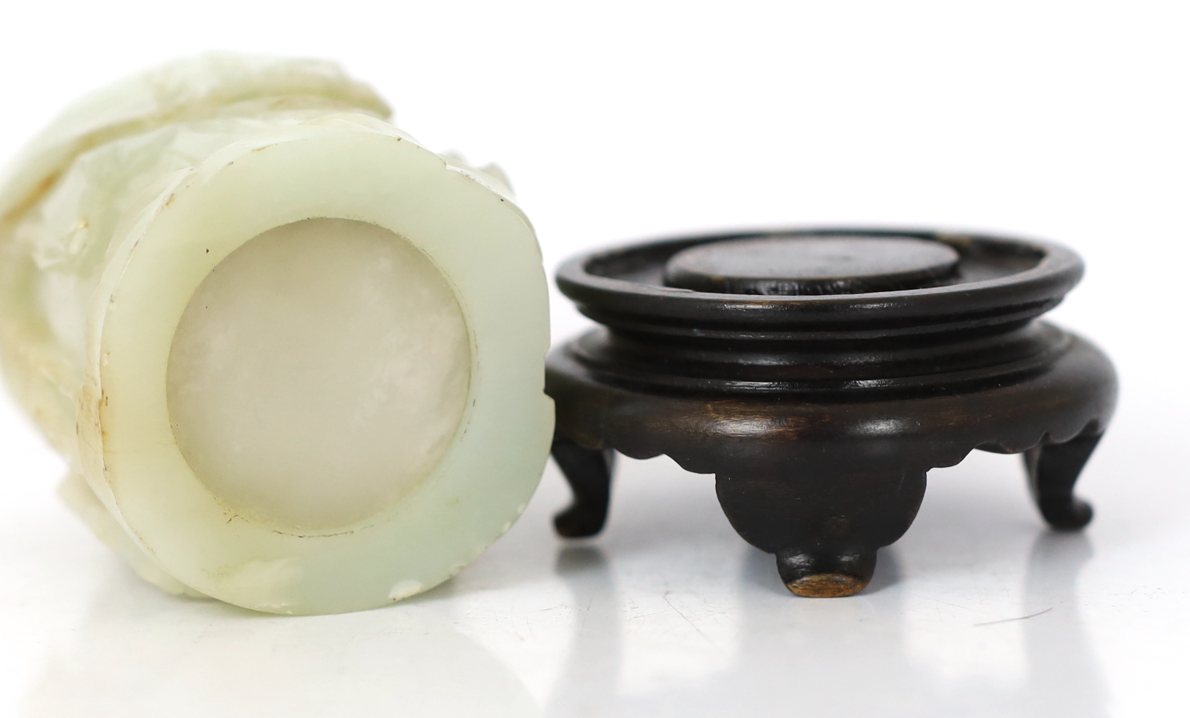 A Chinese pale celadon and russet jade brush pot, bitong, 18th century